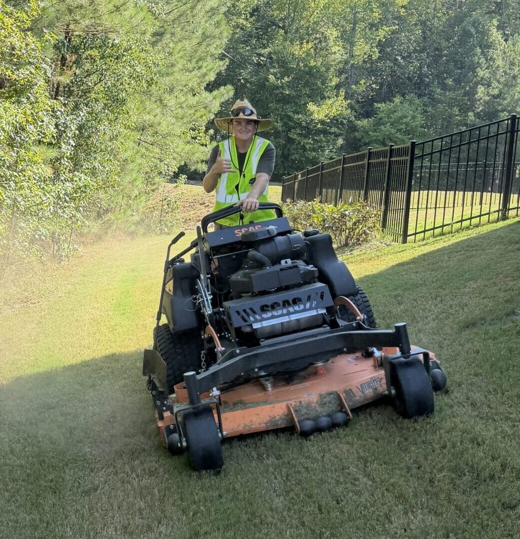 Mark mowing a lawn with our 61-inch SCAG commercial lawn mower
